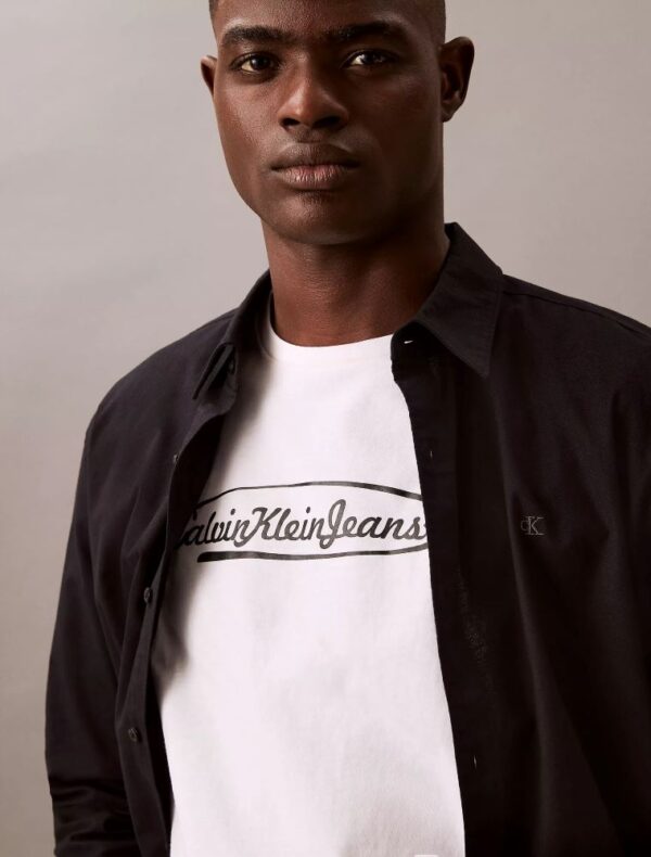 CKJ Lasso Graphic Crewneck T-Shirt