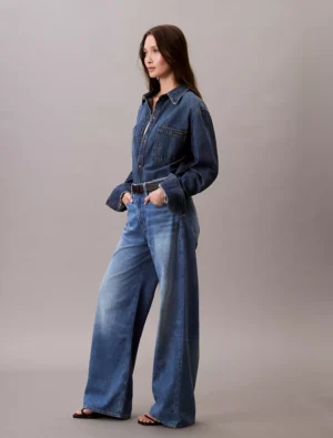 Front view of Calvin Klein Women’s Linen Blend Wide Leg Jeans having an outstanding design, mid-rise waist, and fine logo detailing.